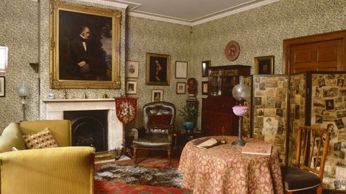 Interior detail of the Drawing Room at Carlyle's House in London showing 19th century furniture and paintings